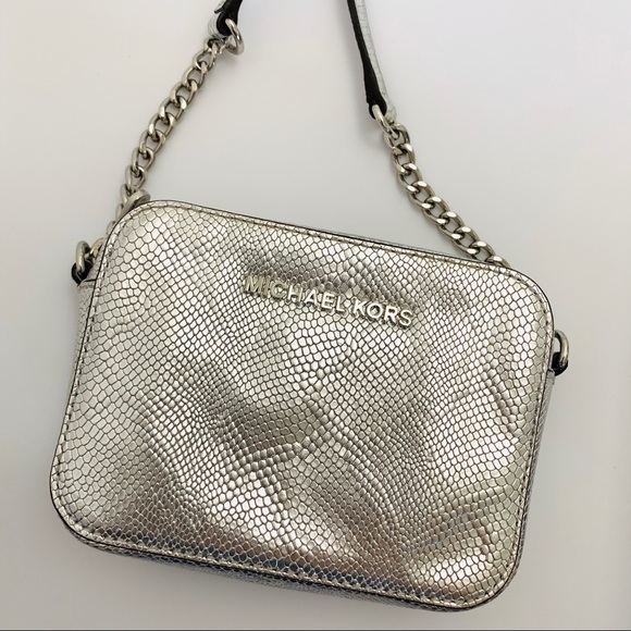 Michael Kors Handbags - NWOT Michael Kors Silver Crossbody bag/purse
